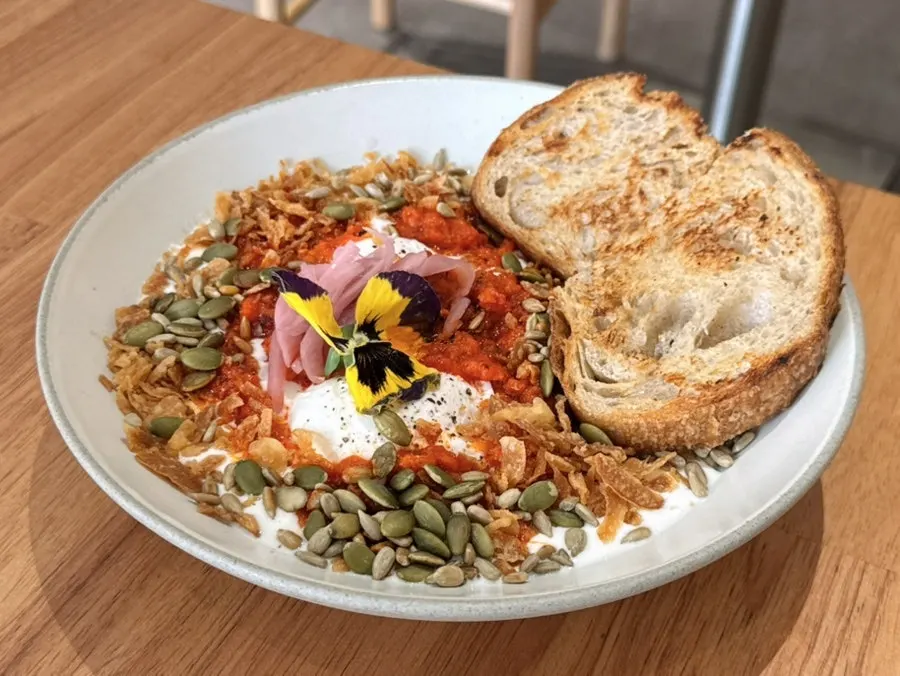 A plate of Famous Benny's garlic butter egg