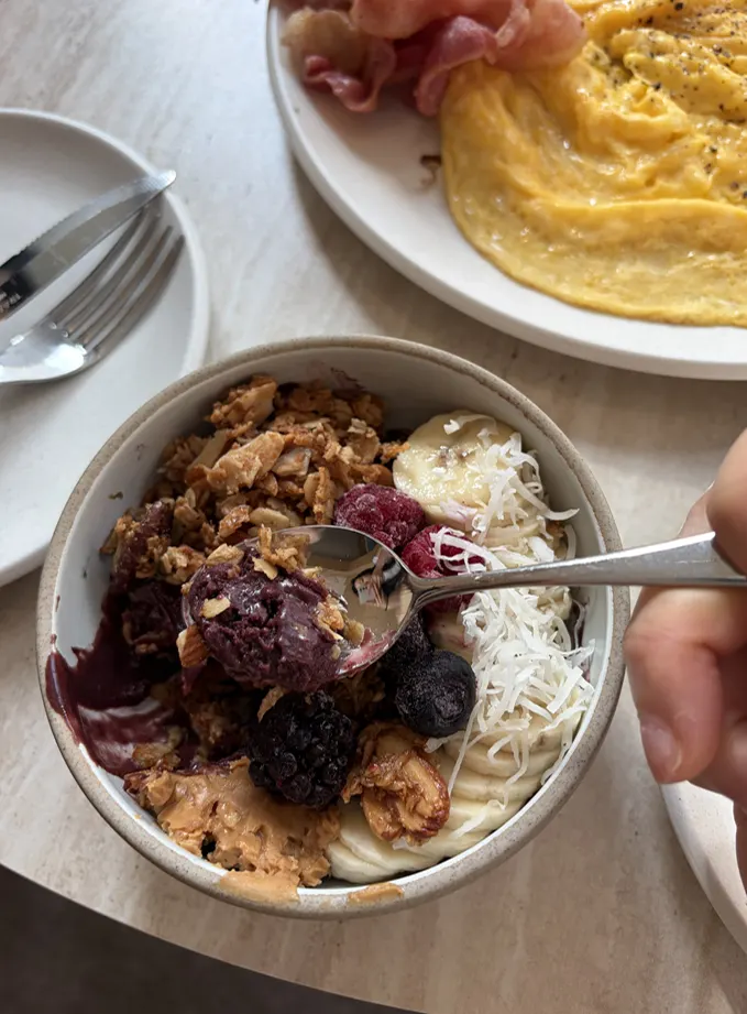 Acai bowl topped with banana and nuts