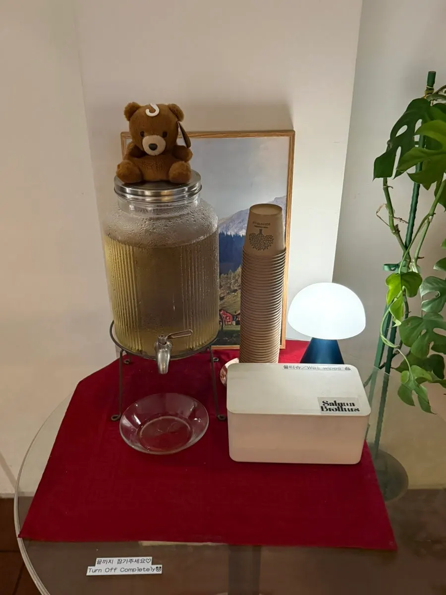 Self-serve bar with water and wet wipes