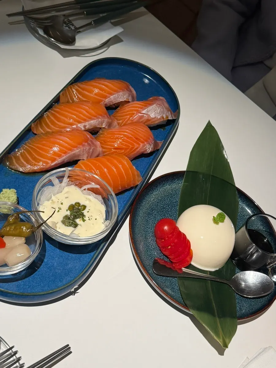 Thick slices of raw salmon sushi