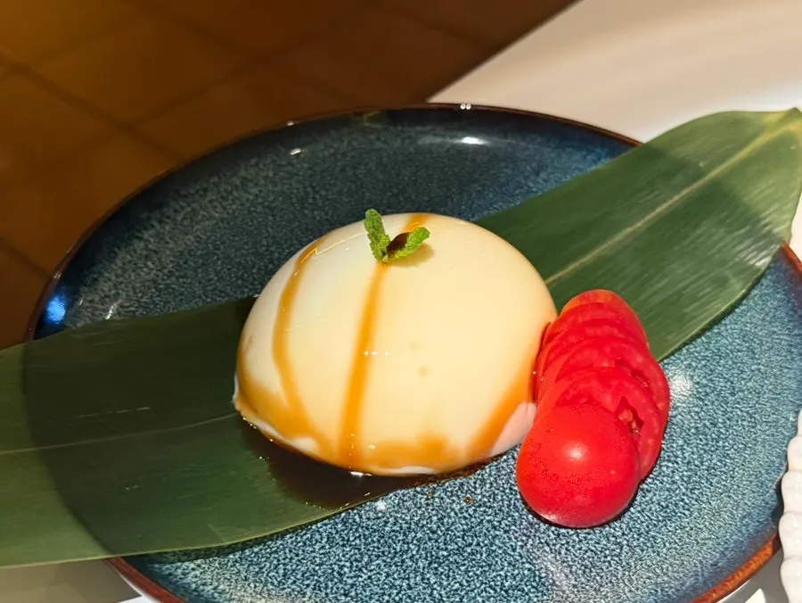 Mochiri tofu served with brown sugar syrup