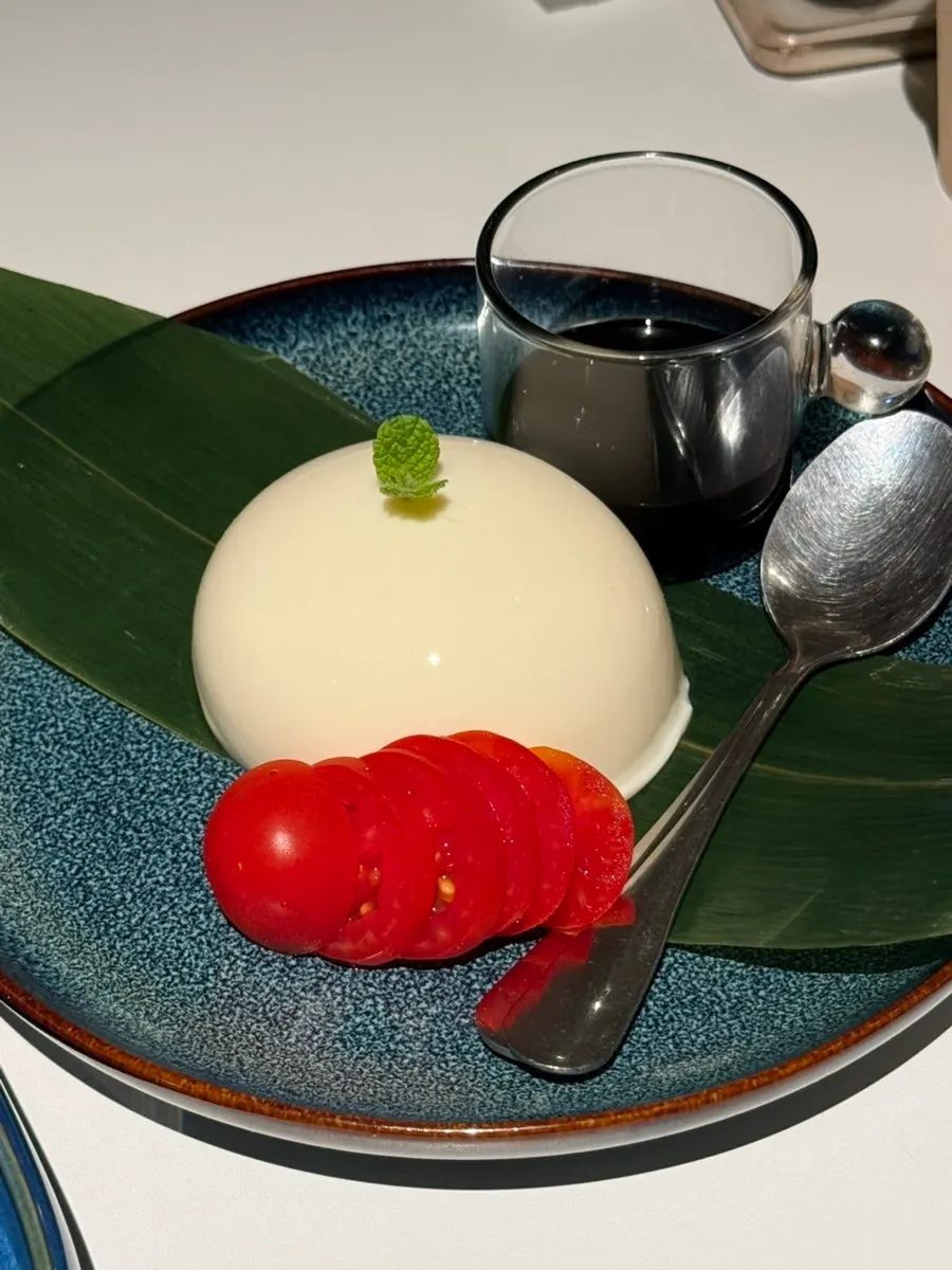 Mochiri tofu served with cherry tomatoes