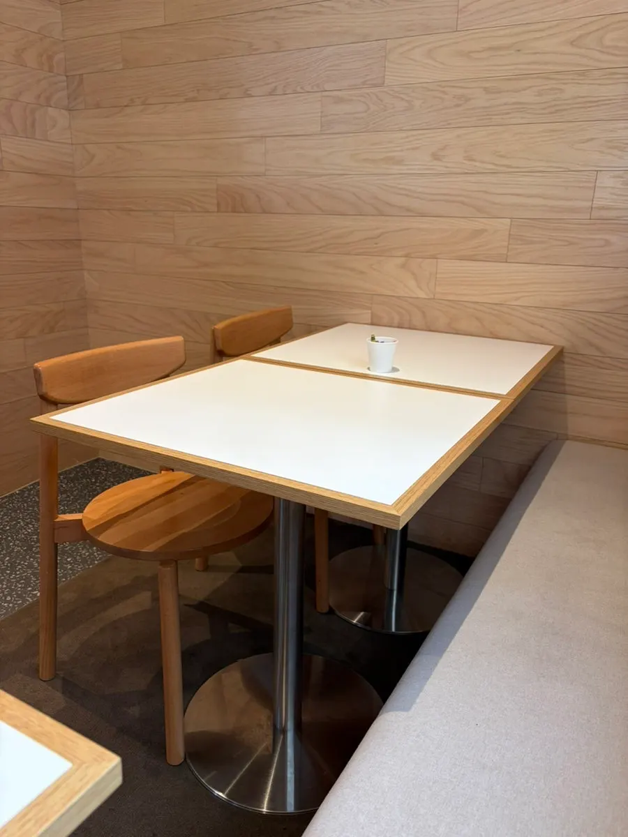 Restaurant counter seats and table setting