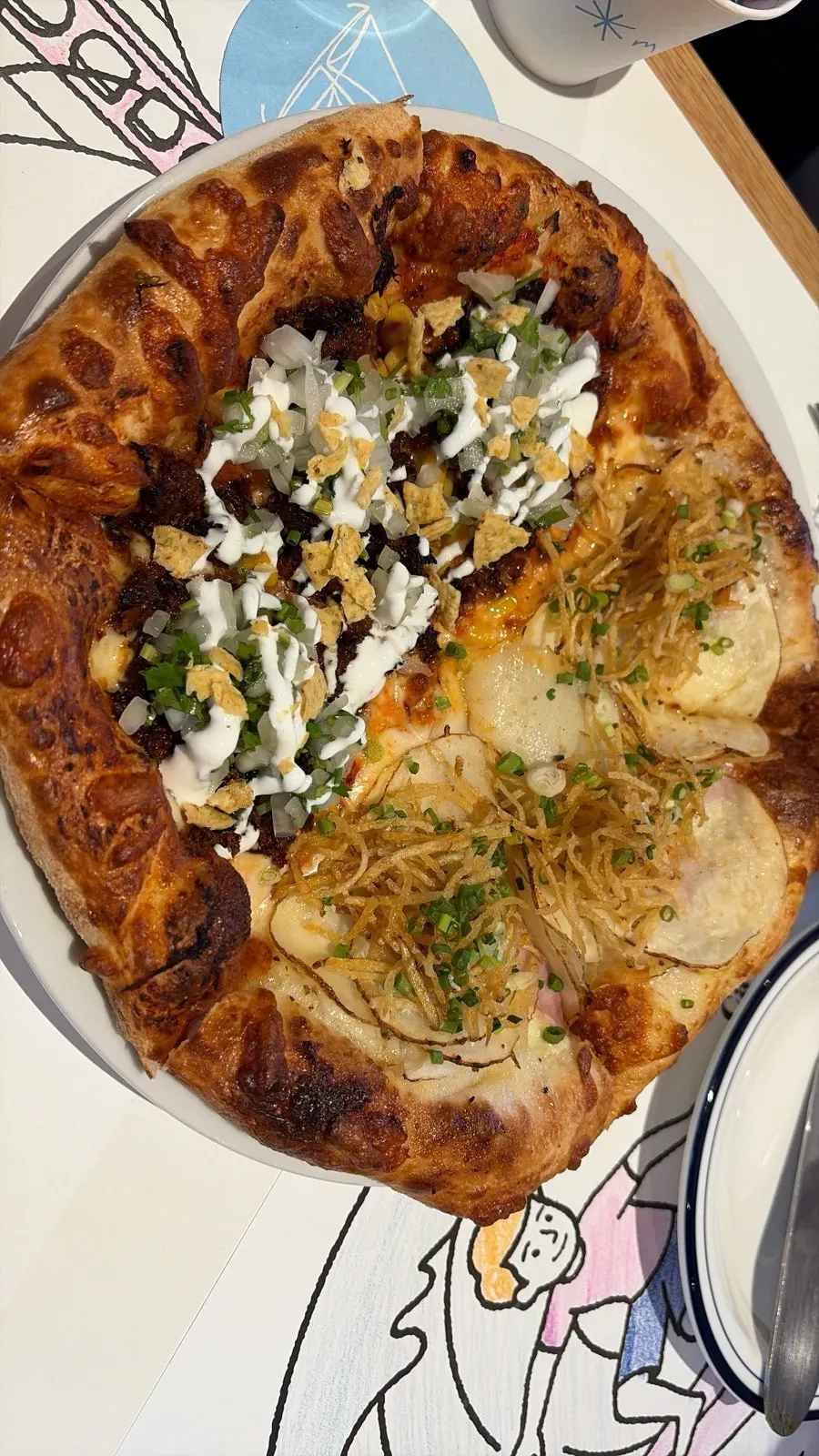 Half potato and birria pizza