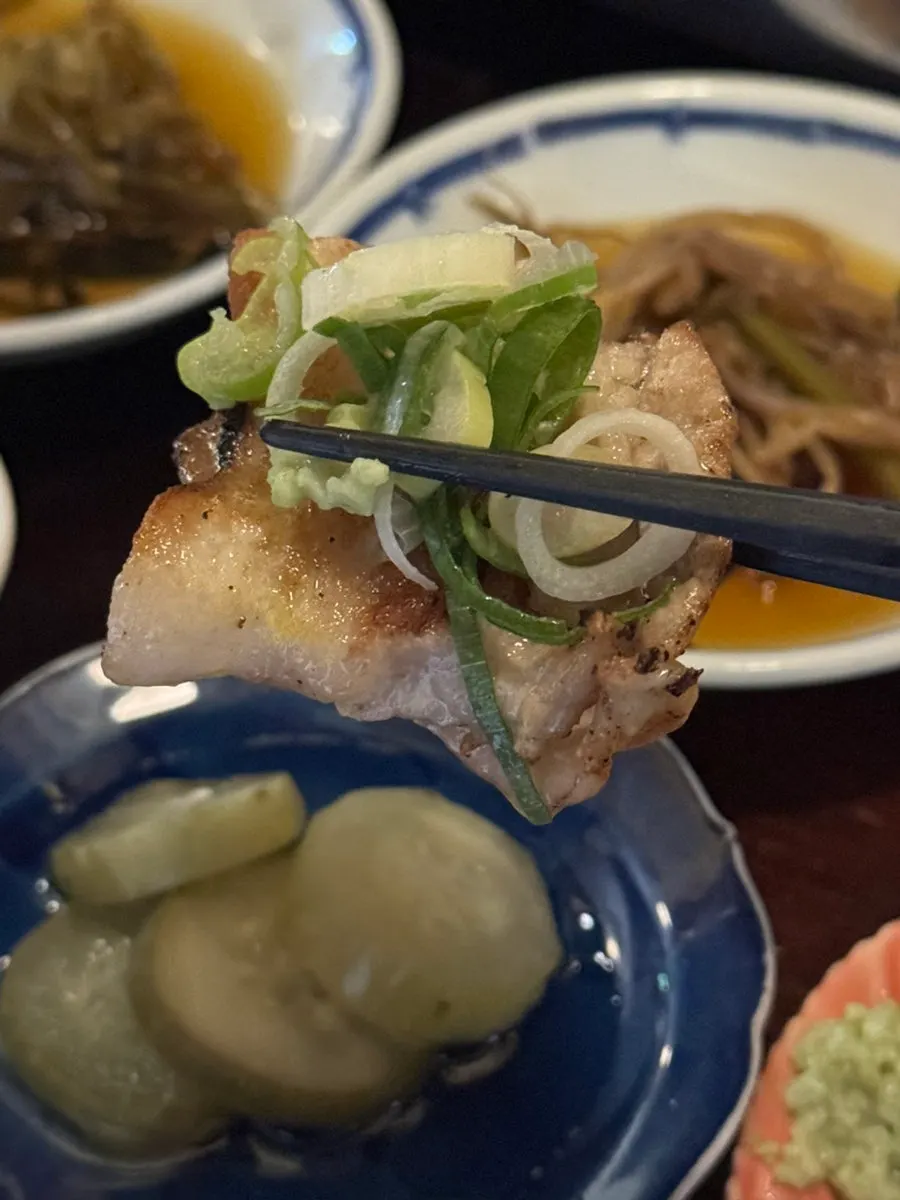 Grilled pork belly and side dishes on the table