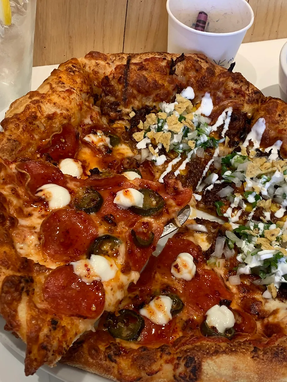 Close-up of a pizza packed with pepperoni