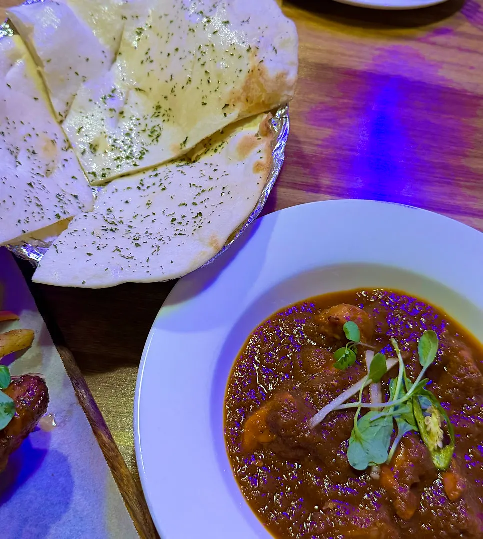 A bowl of chicken tikka masala curry
