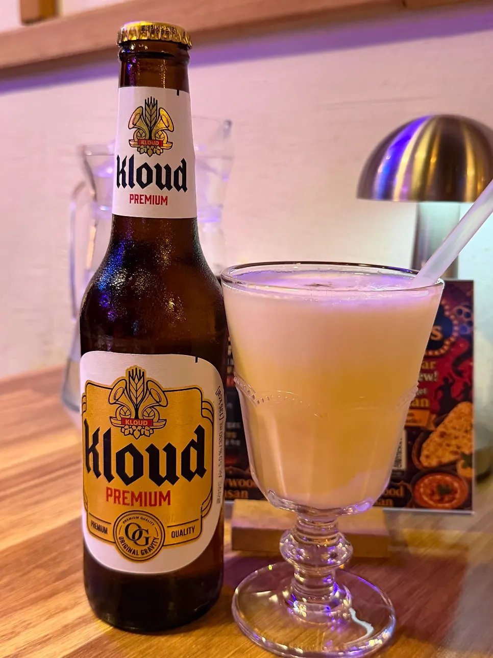 Table with mango lassi and beer