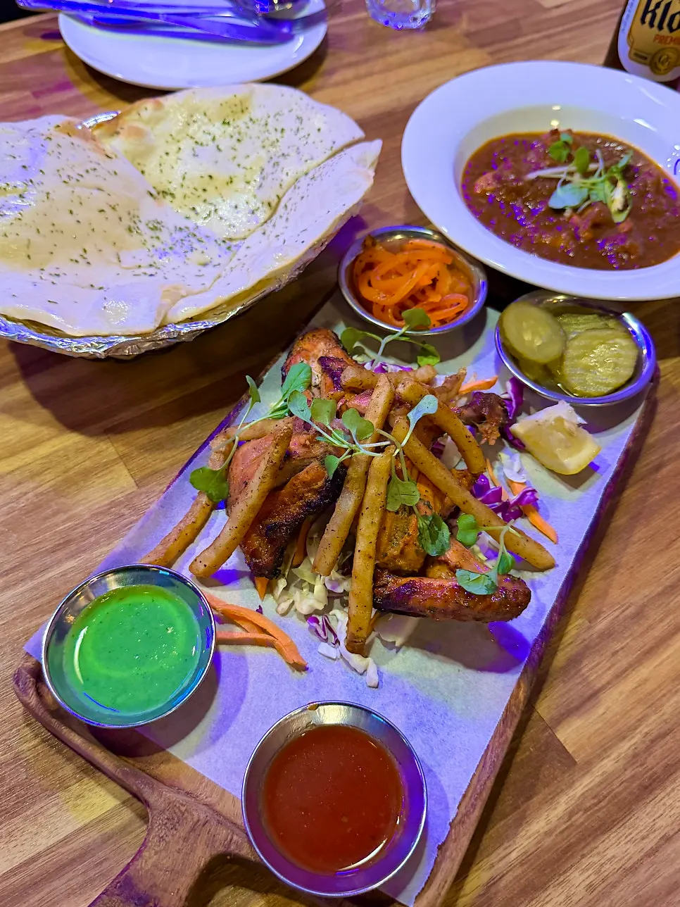 A cold glass of beer with curry