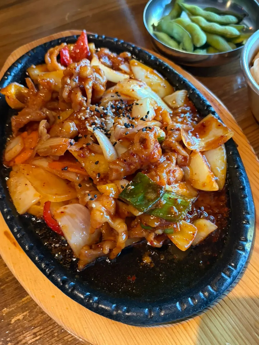 Chicken feet served on a griddle