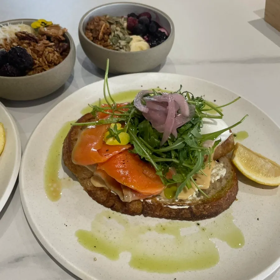 Brunch plate served alongside the avocado toast