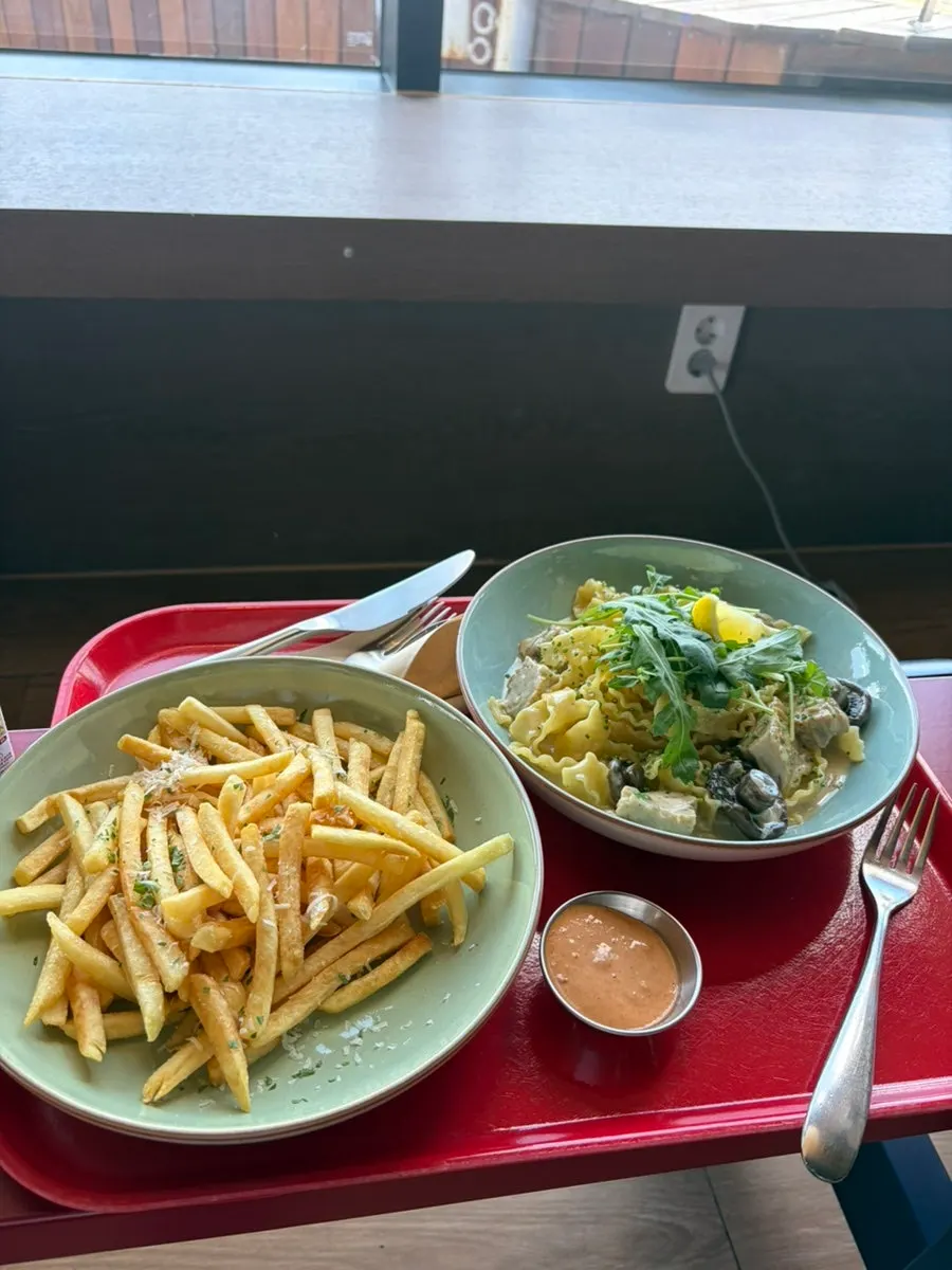 The ordered brunch and pasta on the table