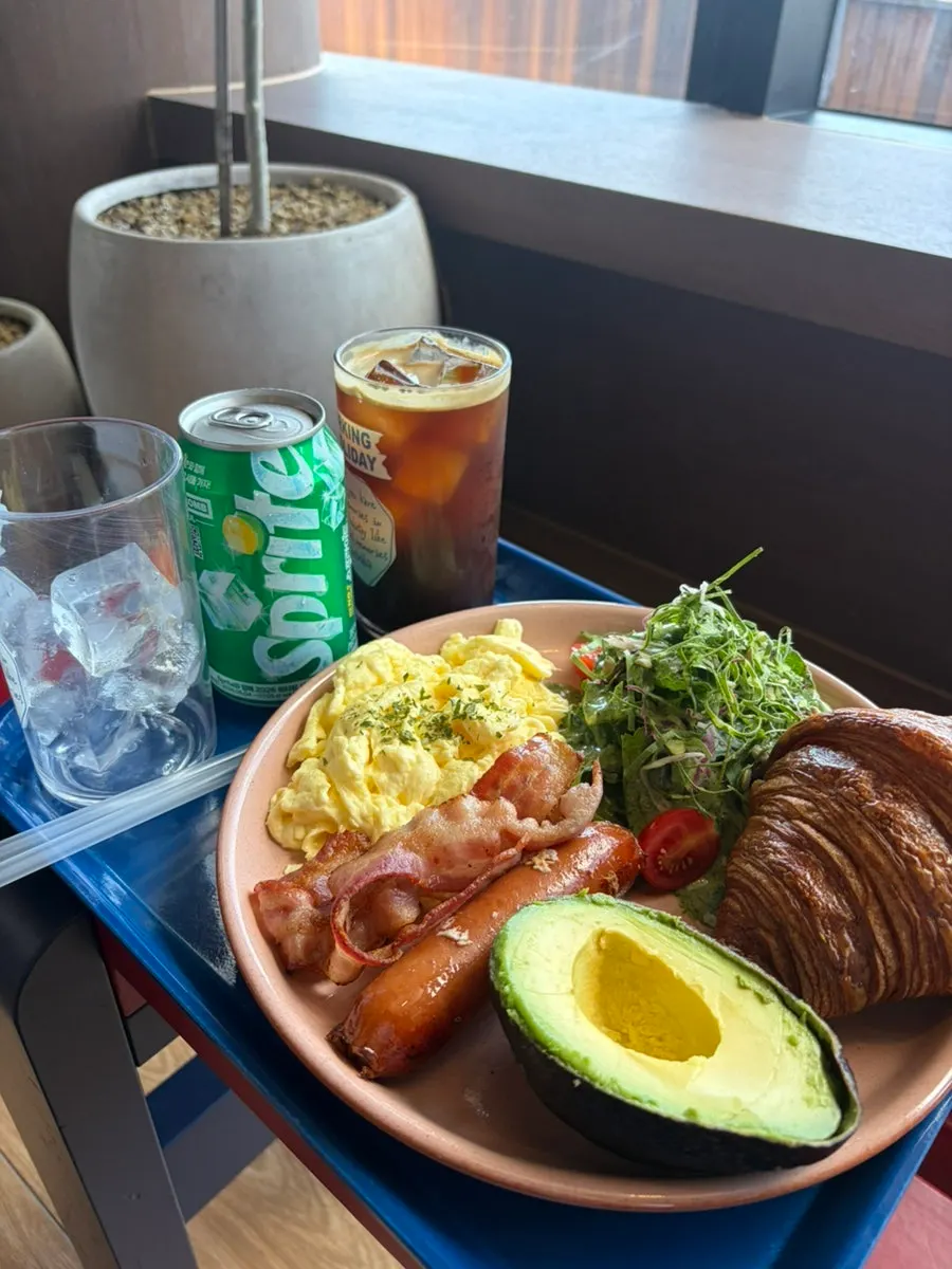 Big Brekkie plate with croissant and scrambled eggs