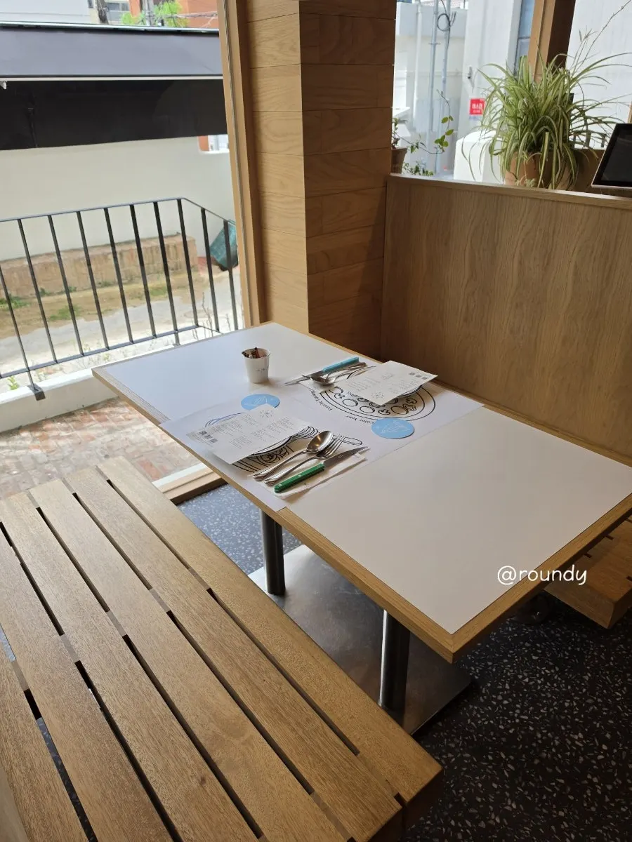 Window seat at Extra Mile