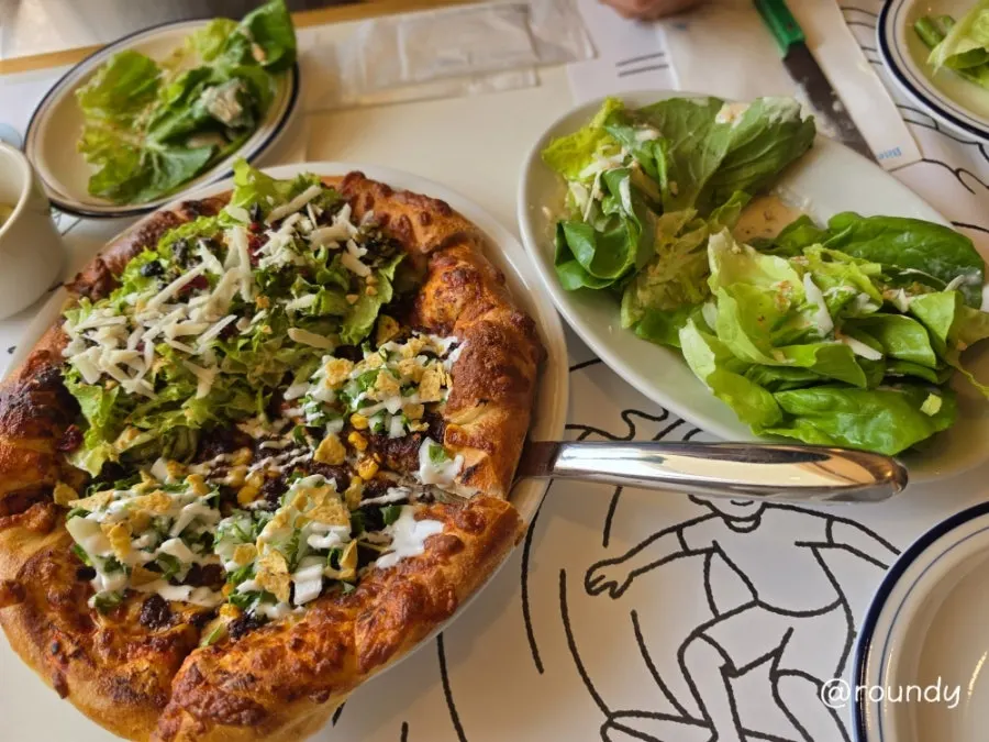 Pizza and pasta spread at Extra Mile