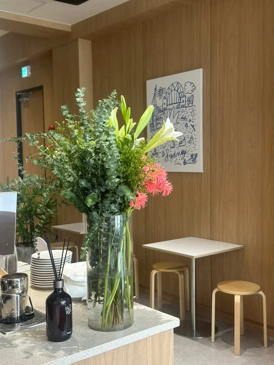 Seating and table setup at Famous Benny Gwangalli Branch