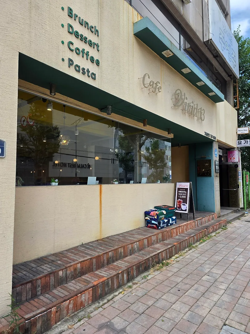 Exterior of Vivid13 Gwangalli Main Branch on the café street near Gwangalli Beach