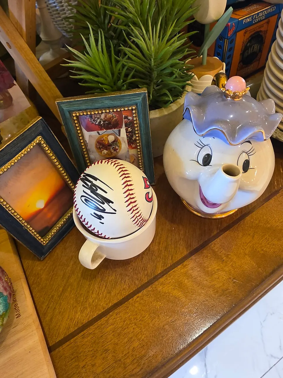 Dolls and cute props displayed in front of the counter