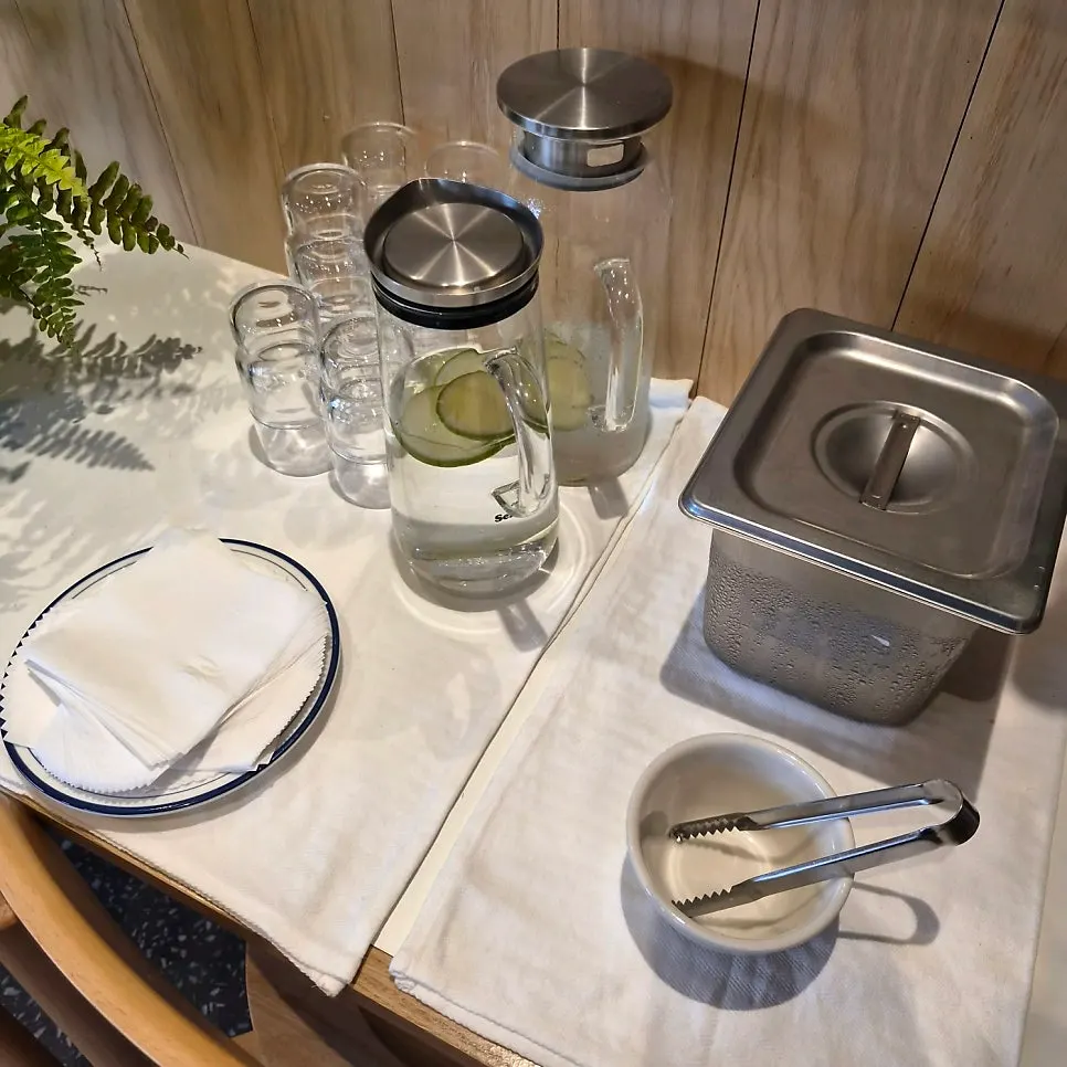 Open kitchen where the cooking process is visible