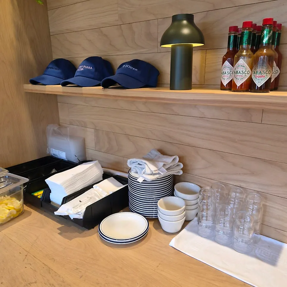 Self-bar with water, pickles and sauce