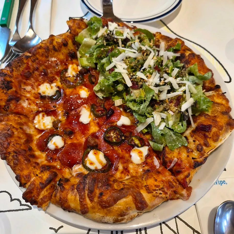 The half-and-half pizza served first