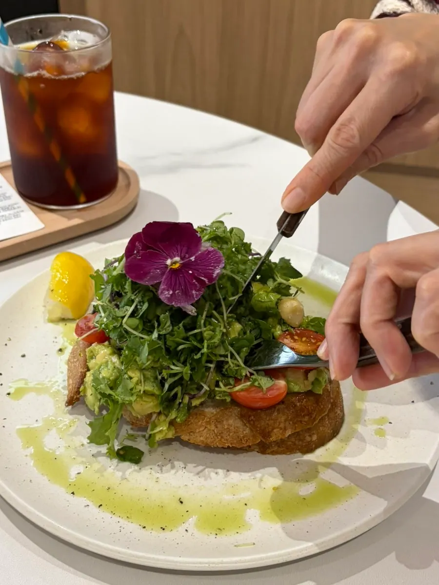 Avocado toast piled high with avocado