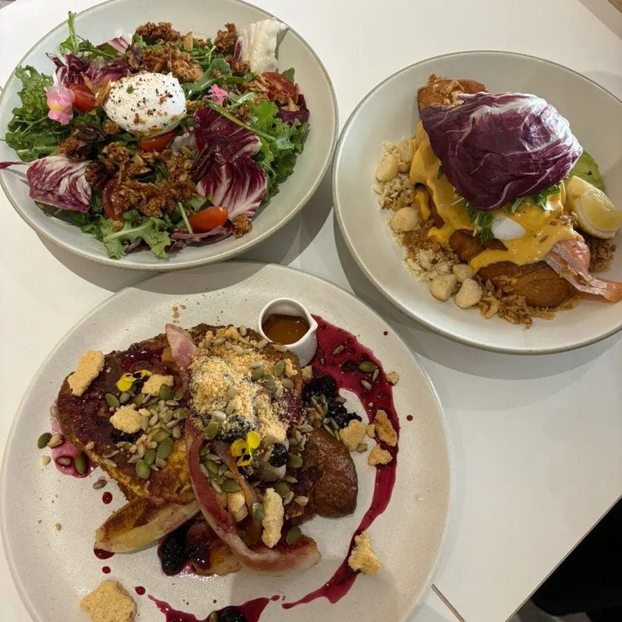 Full spread of brunch and coffee ordered by four people