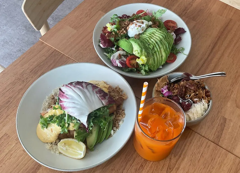 A full spread of brunch dishes on the table