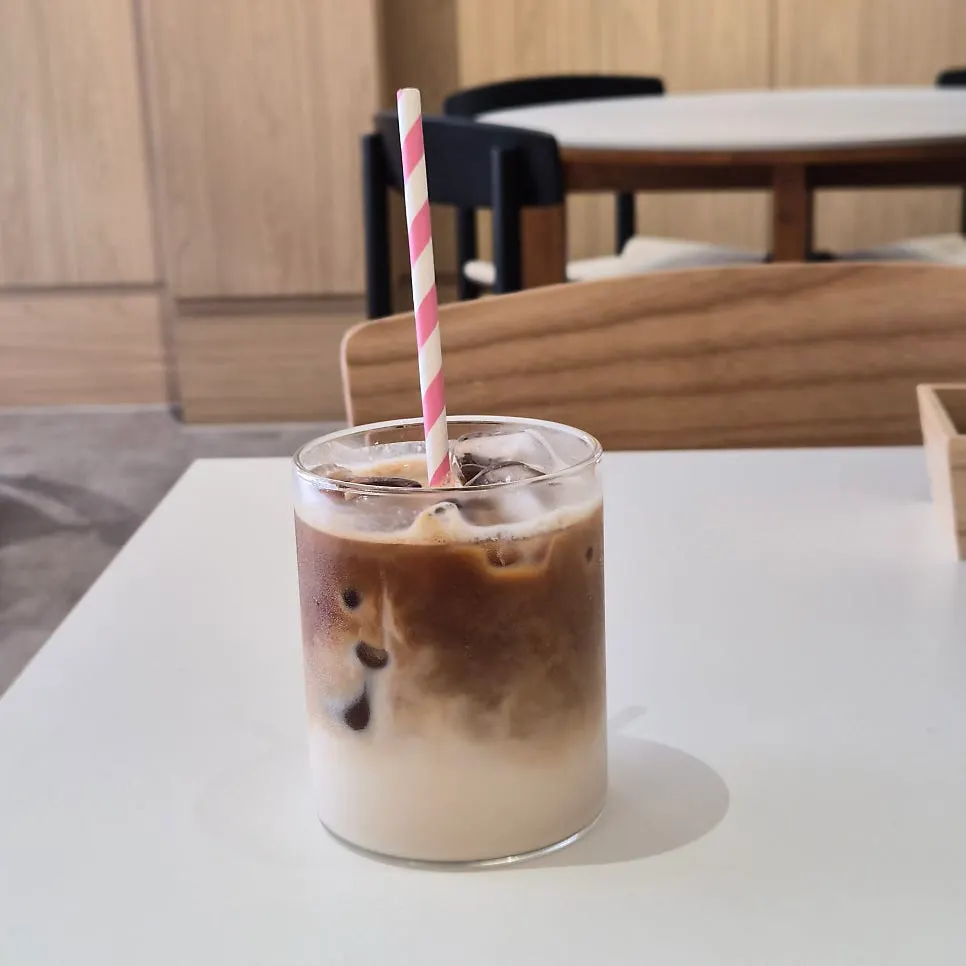 Iced café latte placed next to the brunch