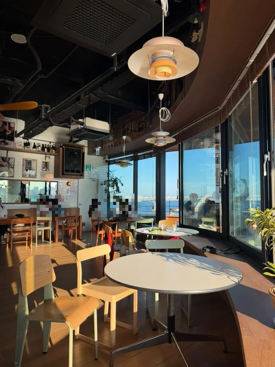 A photo-zone-style seating view at the Gwangalli café