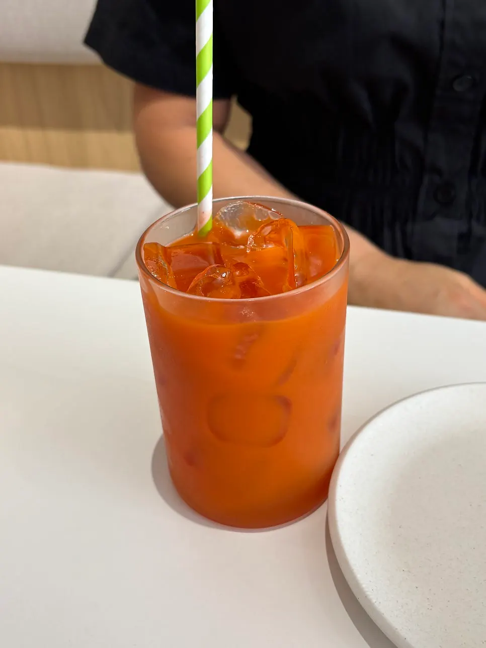 A glass of freshly pressed apple carrot juice