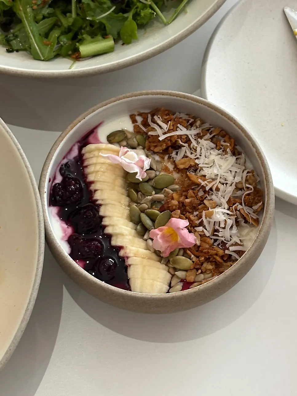 Yogurt bowl with granola and banana