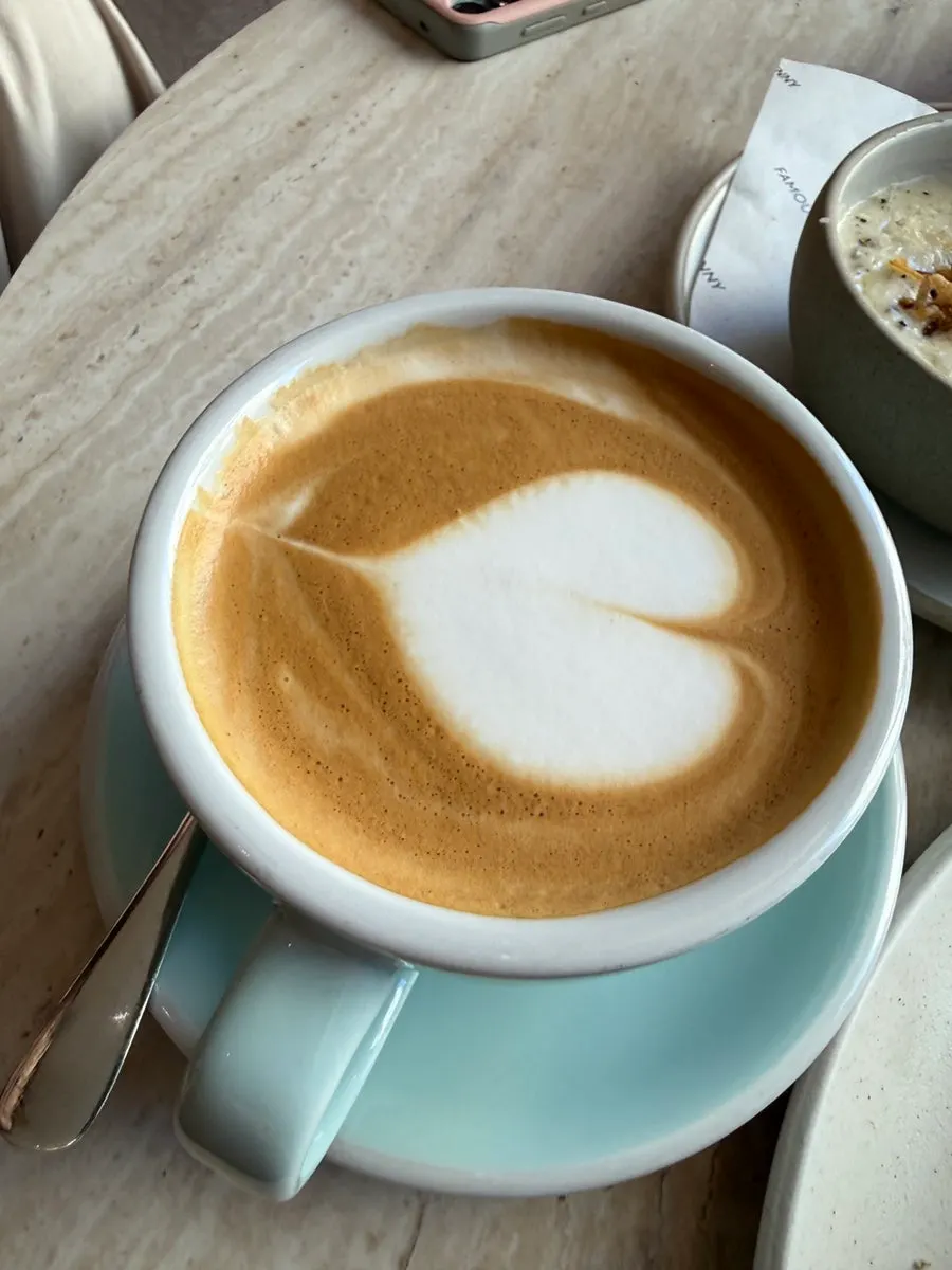 A cup of Famous Benny's latte