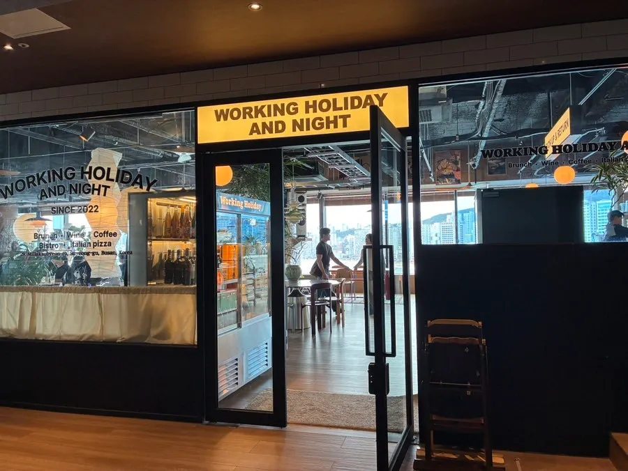 Entrance to the 7th-floor building where Working Holiday Minrak is located