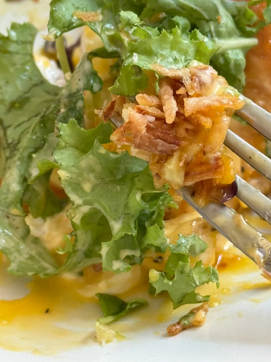 Crunchy onion chips on top of the salmon benny