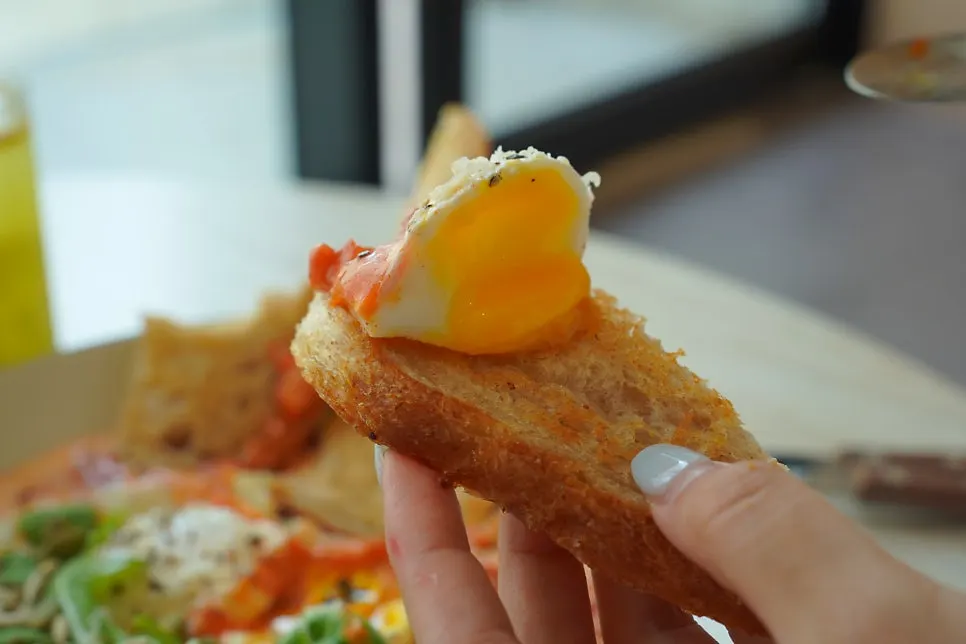 A plate of shakshuka served with bread
