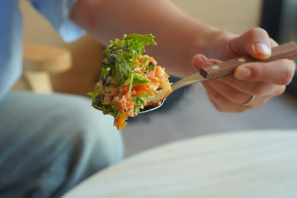 A plate of salmon Benny served with vegetables