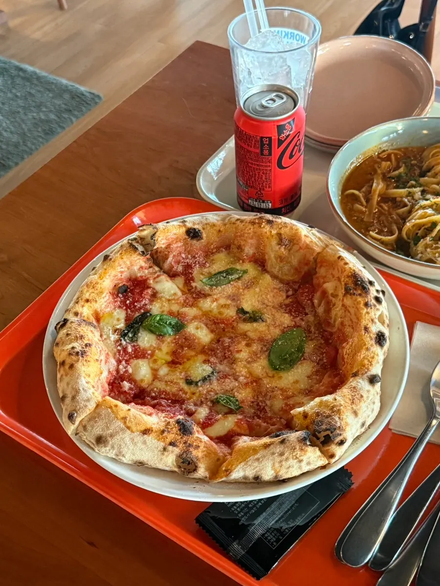 Pizza and drinks on the table