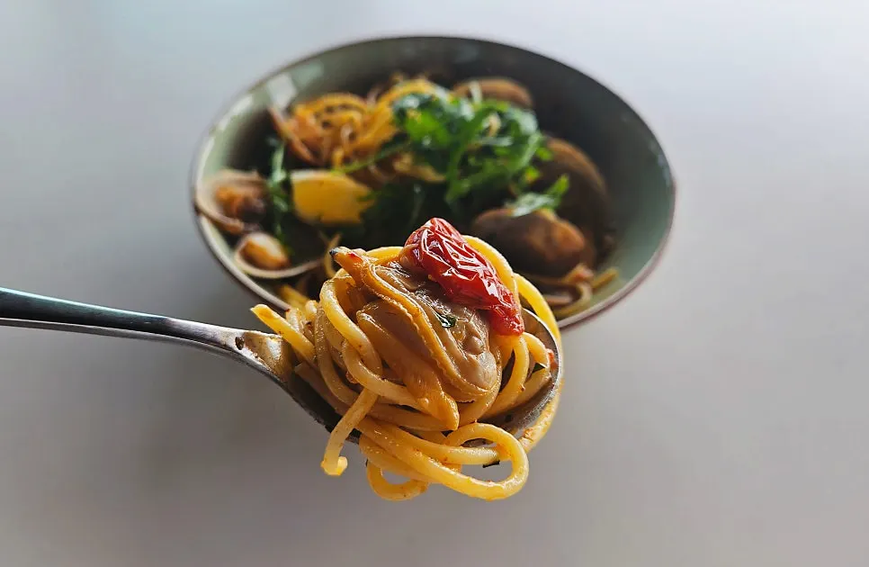 Noodles lifted from the shrimp oil pasta