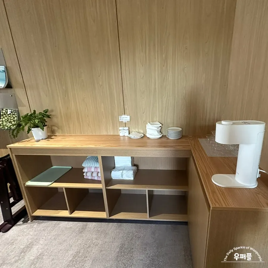Water, salt, pepper and small plates at the 2nd floor self-service bar