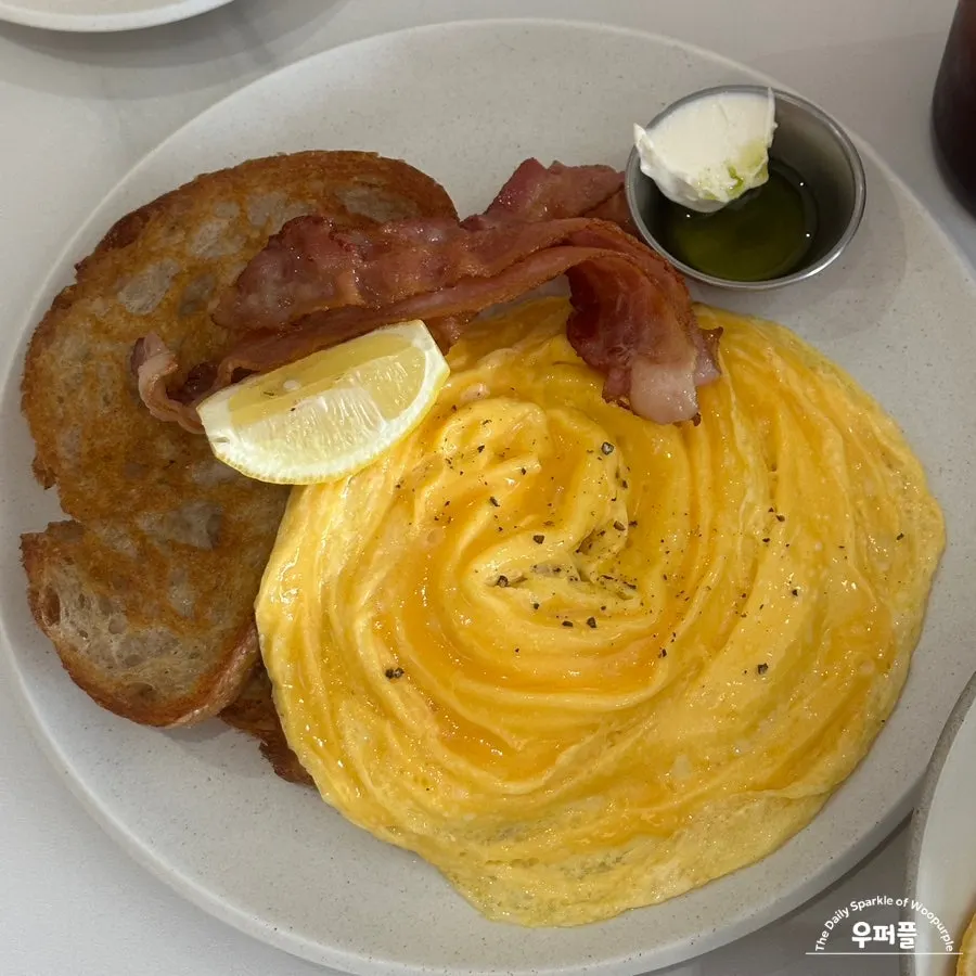 A plate of bacon scramble toast