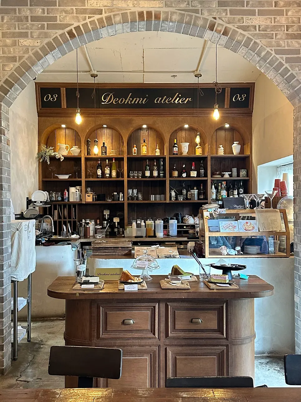 Counter area with dark wood-tone furniture
