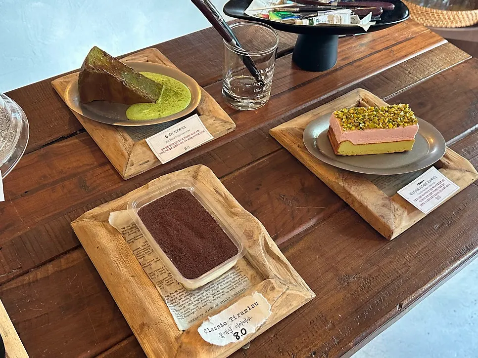 Dessert case with matcha cream cake on display