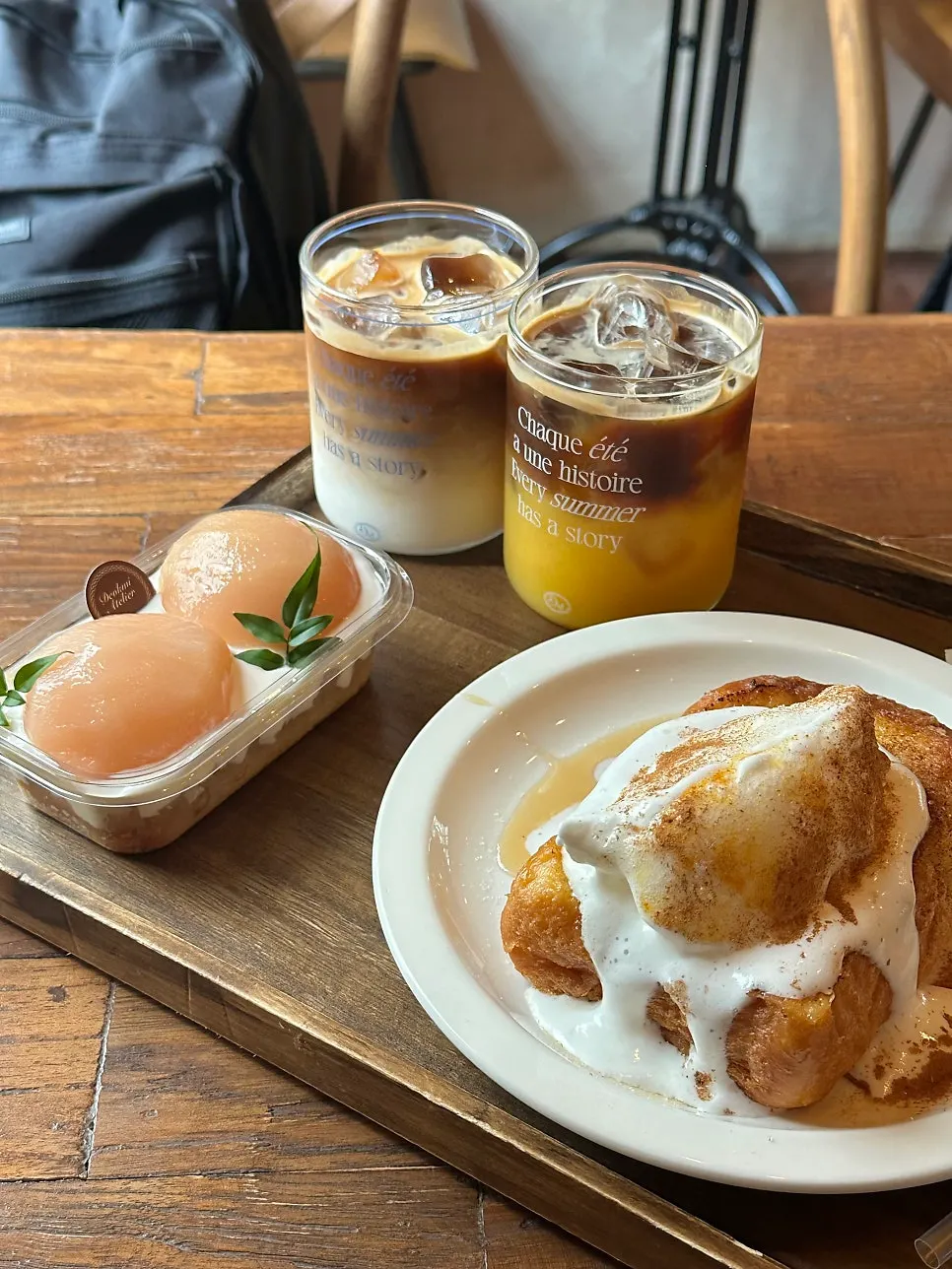 Full view of the café table with desserts and drinks