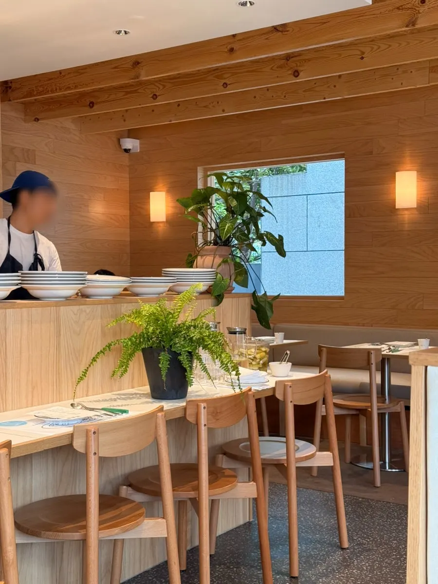 Interior of Extra Mile with wood-tone design