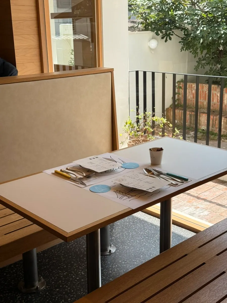Lighting and seating inside Extra Mile