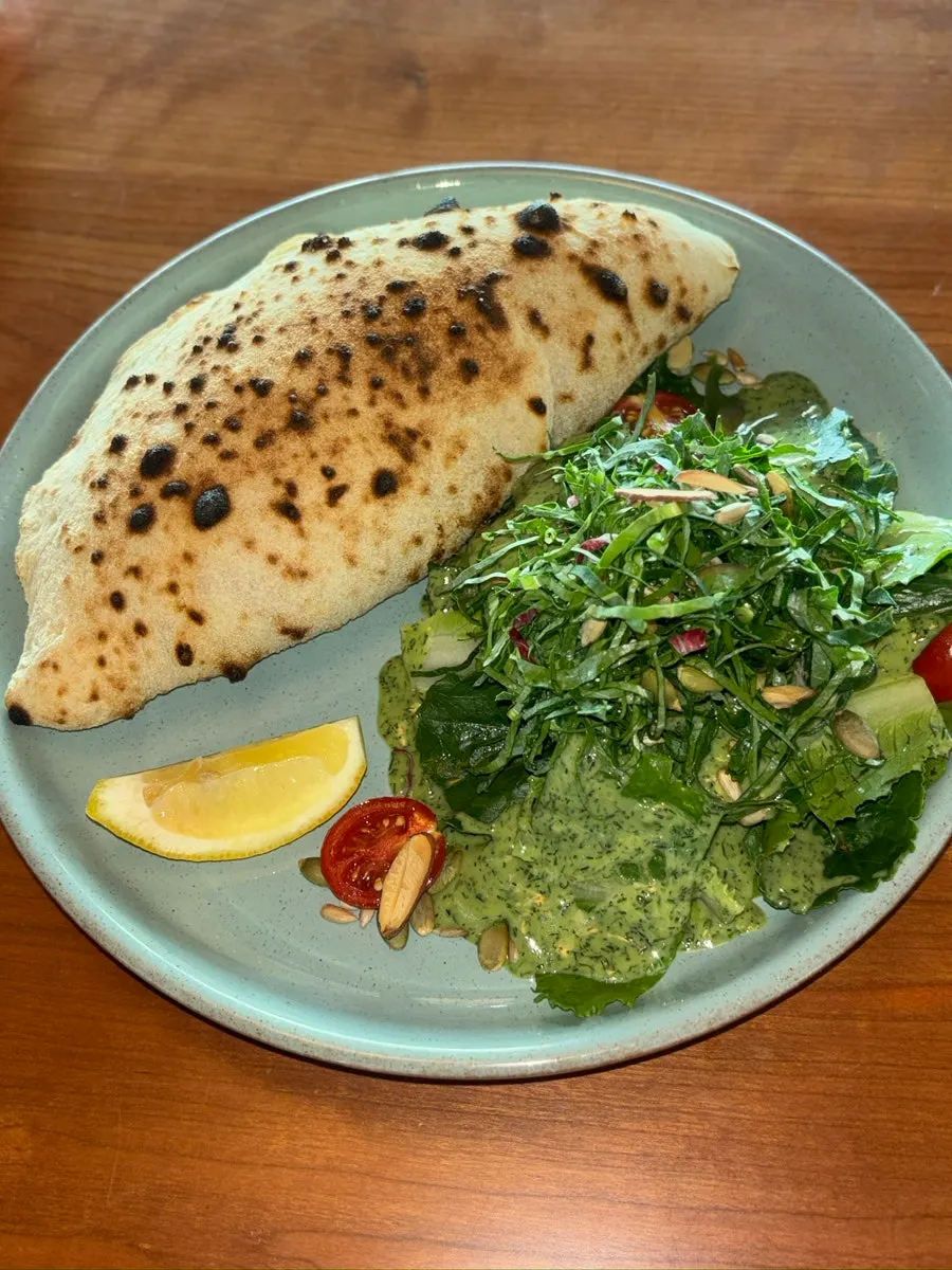 Calzone filled with ragù sauce and cheese