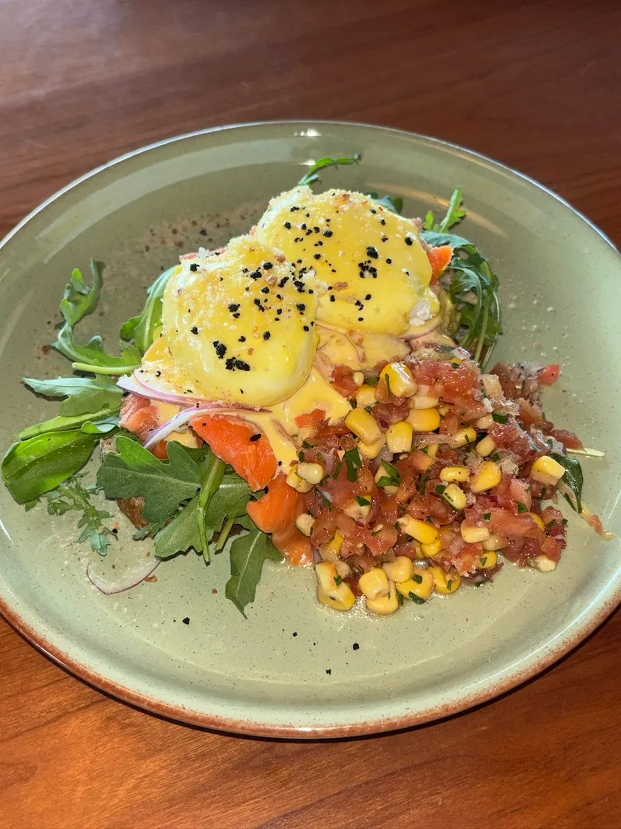 Eggs Benedict topped with smoked salmon