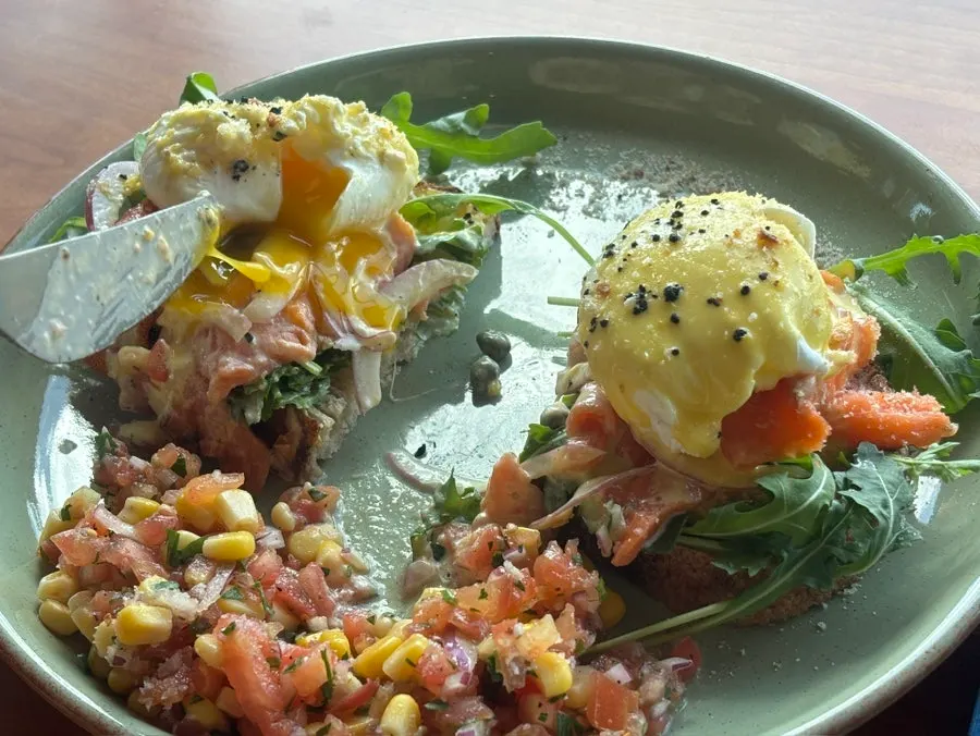 Salmon eggs Benedict cut in half