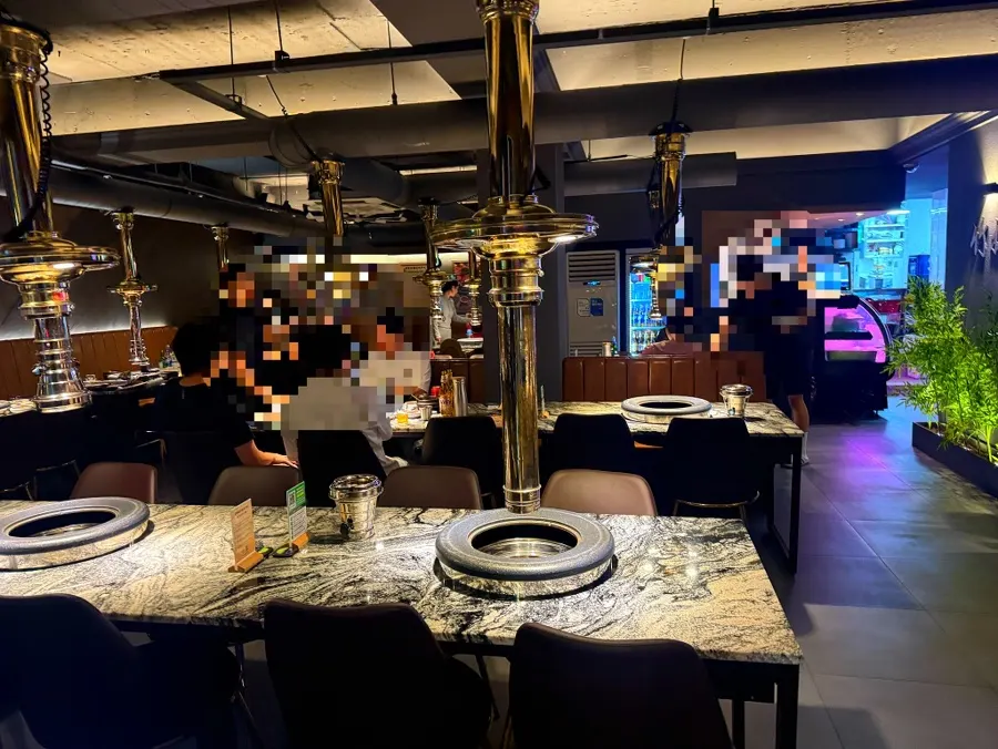 The spacious, lit interior of the restaurant
